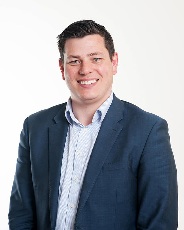 Sales Manager headshot photograph against a clean white background