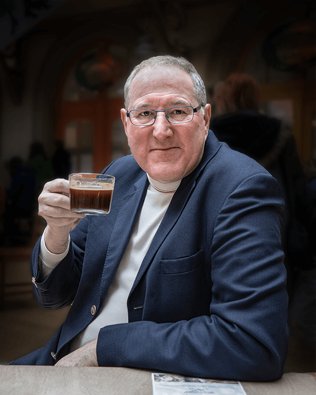 Relaxed Branding Portrait Headshot of Photographer Phill Andrew at The Image Mill drinking coffee