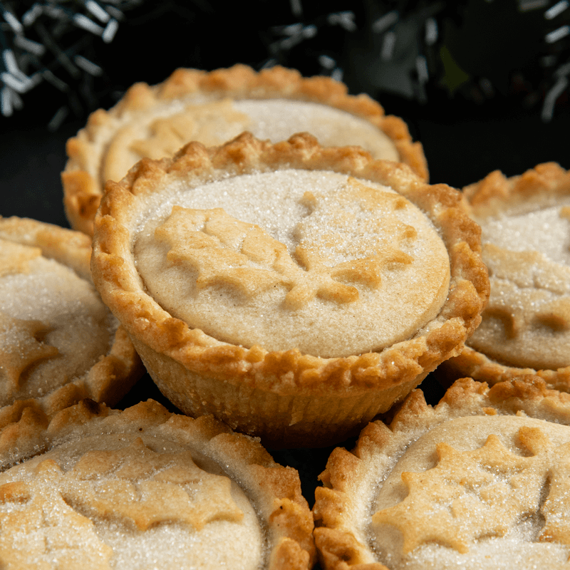 Close image of mince pies covered in sugar granules
